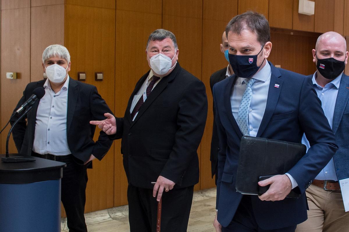 Biochemist Pavol Čekan, infectologist Vladimír Krčméry and PM Igor Matovič before discussing of measures against spread of Covid-19.