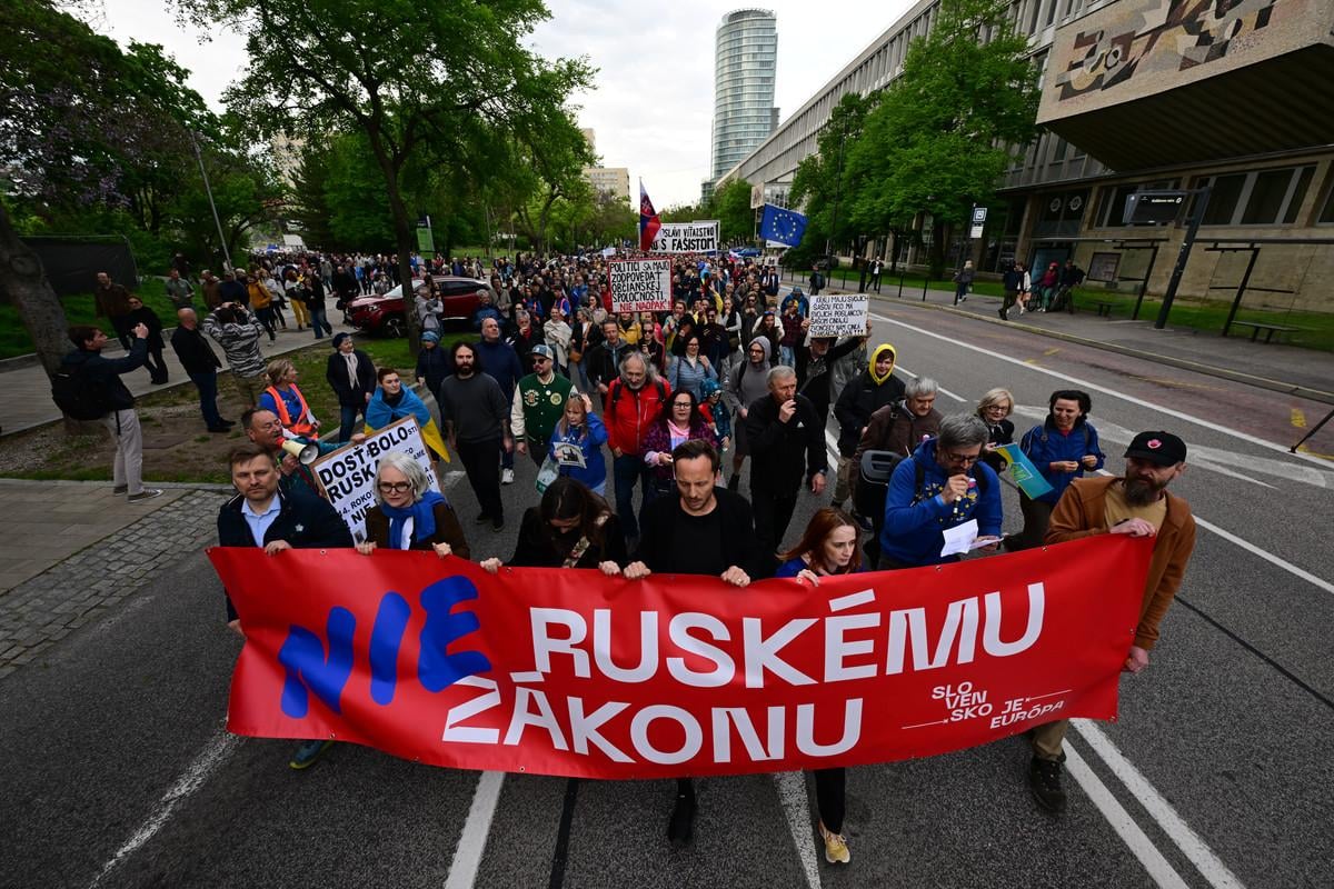 Protesters hold a banner reading “No to the Russian Law” during a “Slovakia Is Europe” rally held in Bratislava on Thursday, April 24, 2025.