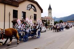 Horse wagon parade during Jánošík Days in Terchová
