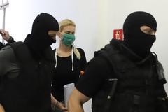 Monika Jankovská (centre) will remain in custody.
