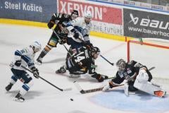 Na snímke vpravo brankár Jaroslav Janus (Košice) a vľavo Marko Stacha (Nitra) v piatom zápase finále play off hokejovej Tipos extraligy HC Košice - HK Nitra v Košiciach