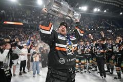 Košice player Jaroslav Janus with the championship trophy after Game 7 of the Tipos Extraliga playoff final between HC Košice and HK Nitra on 29 April 2025 in Košice.