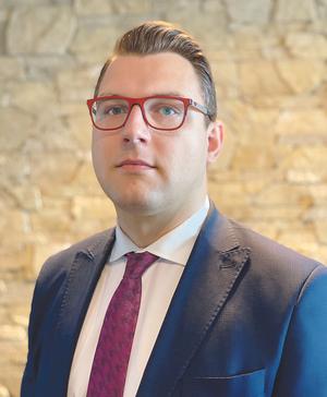  Michael Válek, junior associate
