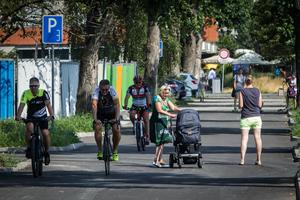 The Danube promenade with pedestrians and cyclists.