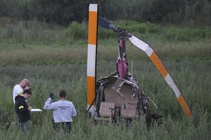 Rescuers, firemen and police checked on the crash site. 