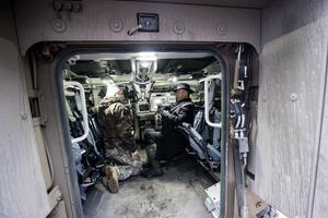Defence Minister Peter Gajdoš sitting in the prototype 8x8 Slovak-Finnish armoured vehicle.