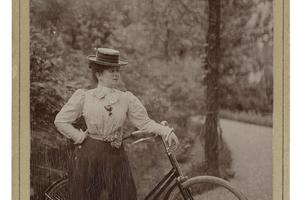 Portrait of actress Mária Bárkány with a bicycle