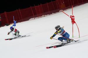 United States' Paula Moltzan, right, and Slovakia's Petra Vlhová speed down the course during the final of an alpine ski women's World Cup parallel giant slalom in Lech/Zuers, Austria.
