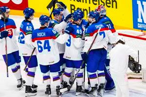 Slovak ice-hockey players celebrate their victory over France.