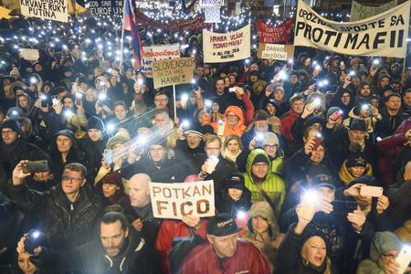 People in Slovakia protest against Robert Fico's government in Bratislava on January 18, 2024.