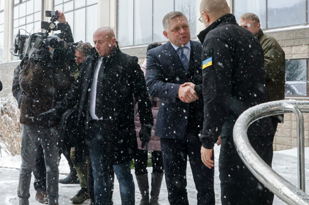 Slovak and Ukrainian Prime Ministers Robert Fico and Denys Shmyhal shake hands in Uzhhorod, western Ukraine, on January 24, 2024.