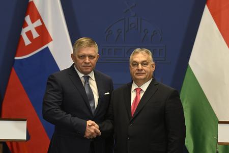 Slovak PM Robert Fico (l) and Hungarian PM Viktor Orbán (r) shake hands during their meeting in Budapest on January 16, 2024.