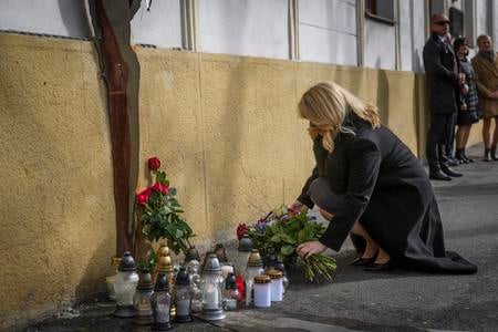 President Čaputová lays flowers at the Kuciak monument in Bratislava on February 21, 2024.