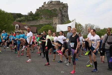 Runners under the Devín Castle in Bratislava.