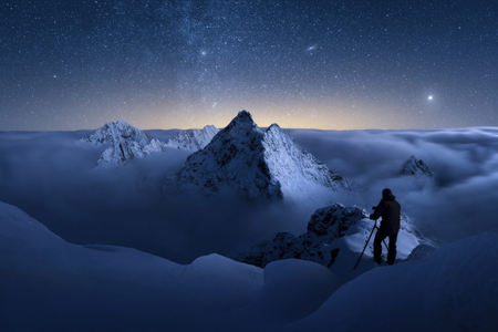 A snowy peak rising from the clouds. Slovak photographer's stunning image wins award