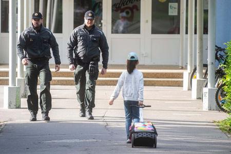 Police patrolled around schools last Thursday after bomb scare two days before. 