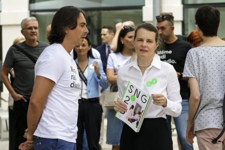 Former SNG director Alexandra Kusá (r) and former SND director Matej Drlička (l) during a press conference outside the Slovak National Gallery in Bratislava on August 7, 2024.