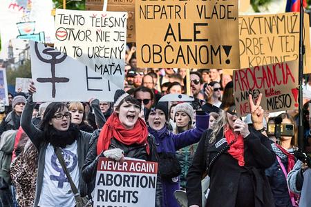 Protesters take to the streets of Dublin in response to the death of an Indian woman who was refused an abortion./Protesters in Bratislava demand the culture minister's resignation.