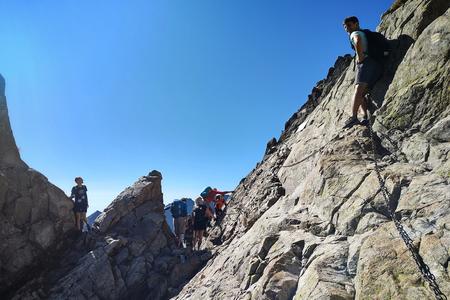 Hikers in the Priečne Sedlo saddle.