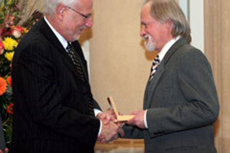 Israeli Ambassador Zeev Boker (left) awarded the prize.