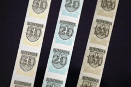 The kolky were used to distinguish Czech from Slovak currency.