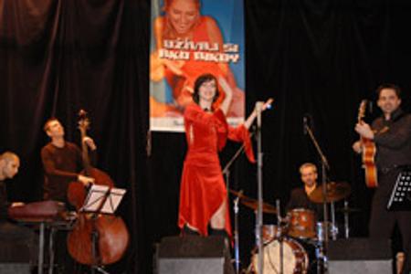 Singer Lucia Lužinská and her band touring schools to teach kids about jazz.