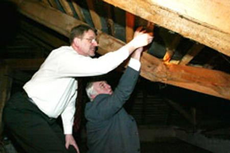 As education minister, Fronc (left) inspected a school in Staré Hory.