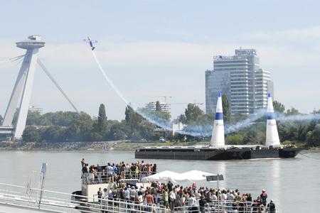 Acrobatic pilots astonished the audience with their daredevil maneuvers. 