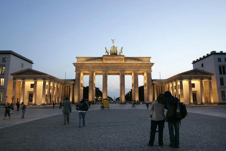 German foundations are helping the development of civil society in over 70 countries. The Brandenburg Gate in Berlin is a symbol of linking the East with the West. 