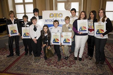 Children who received a Noble Deed award pose after the ceremony.
