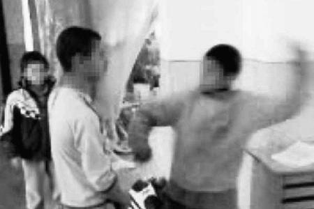 The boys were made to slap each other in the face