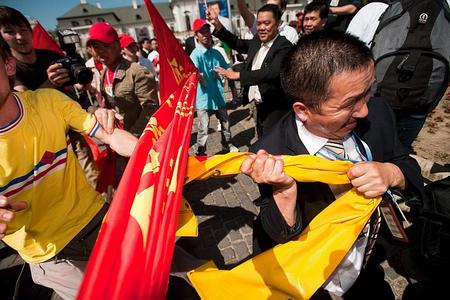 Protesters and unidentified Chinese clashed on June 18. 