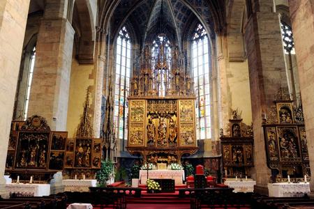 The main altar of the Church of St. Jacob, the highest gothic altar in the world, is made of linden wood without any nails and it's 18.52 metres high. 