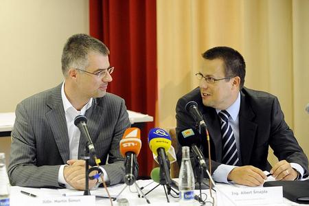 Martin Šimun, the head of Dôvera's board of directors (left) and Albert Šmajda, Apollo's president, announced the merger plans