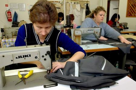 Workers at some textile companies get paid the minimum monthly wage and will appreciate an increase in 2010.