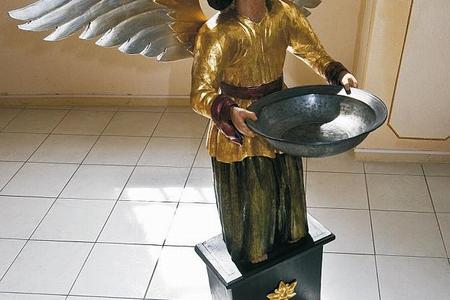 A statue carrying a Turkish inscription.