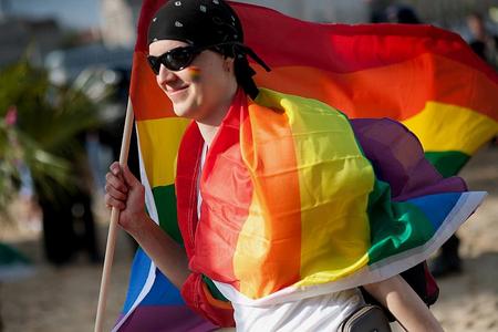 A Gay Pride marcher flies the rainbow flag in Bratislava on Saturday, May 22.