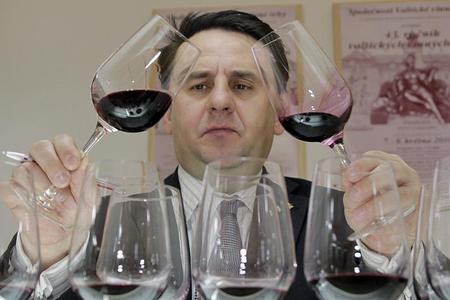 Professional palate: a sommelier ponders his choice.