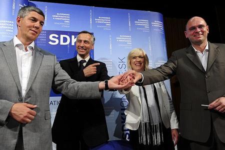 To the victors, the spoils: the four coalition leaders celebrate after their success. 