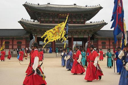 The changing of the guard in front of Gyeongbok Palace in Seoul.