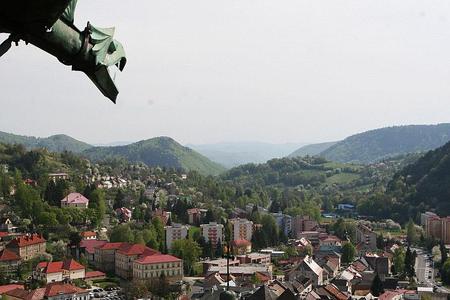 An iron dragon on the castle overlooks the newer part of this former gold-mining town