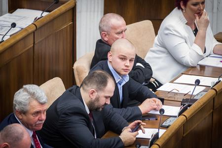 MP Milan Mazurek (centre)