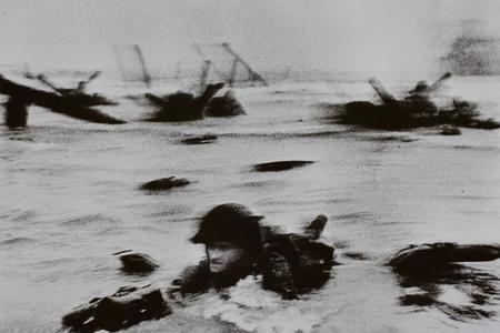 Landing onOmahaBeach by R. Capa.