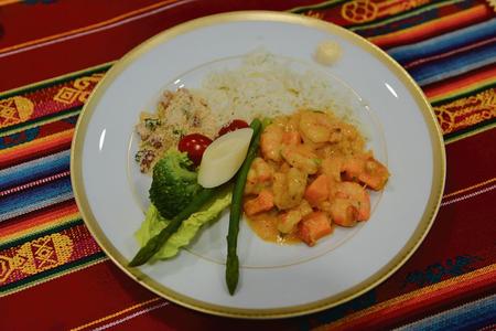 Shrimp and pumpkin, served with rice and vegetables.