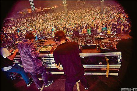 DJs at a Let it Roll event get the audience pumping.