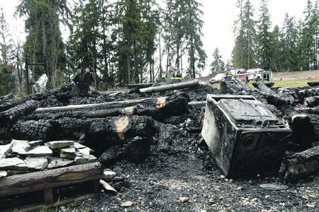 The charred remains of the Burda chalet and information centre.