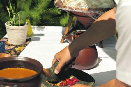 Indonesian Ambassador Djumantoro Purwokoputro Purbo prepares dishes from his homeland.