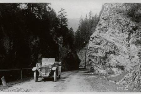 A car mastering sharp turns along the Šturec mountain pass in northern Slovakia in the 1920s.