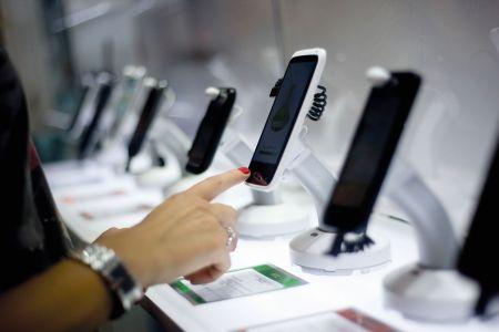 Many people use smartphones to shop.