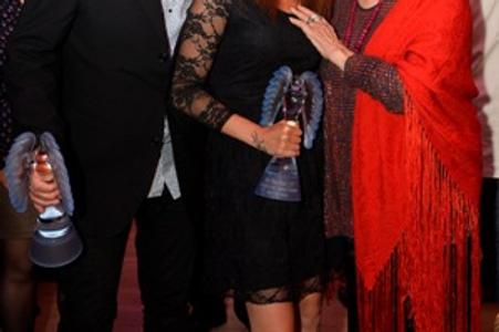 Italian actress Claudia Cardinale (R) with producer of The Way Out film, Miloš Lochman, and actress Klaudia Dudová at final ceremony of the Art Film Fest 